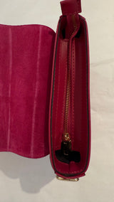 Runde Schultertasche aus Leder und Wildleder in Pink